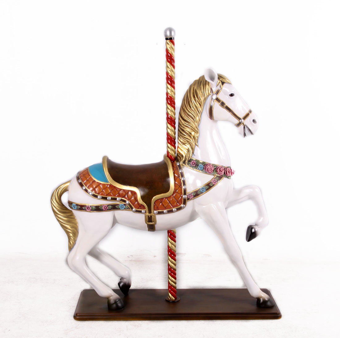large carousel horse statue white with flowers